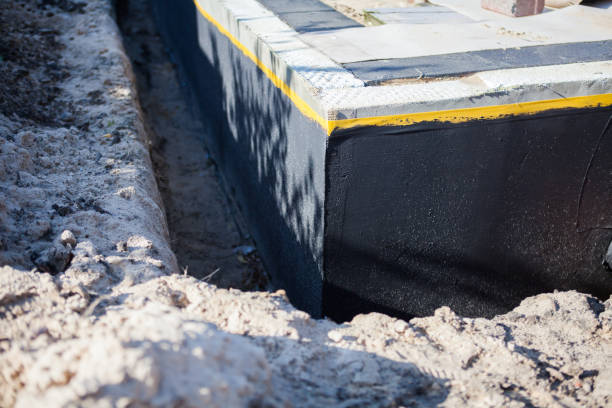 Professional Exterior Waterproofing technician working in Lorton, VA